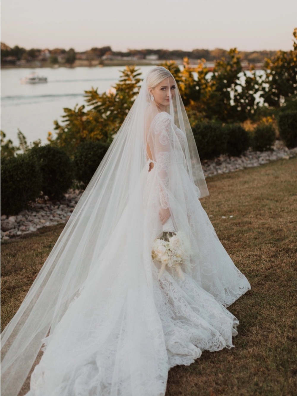 Never worn 108" cathedral veil in light ivory